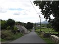 The Slievenaboley Road descending towards the bridge over the Drumadonnell River