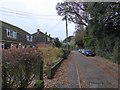 Houses with mansard roofs in Poltimore