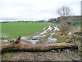 SE5119 : Blocked entrance to waterlogged field, off New Road by Christine Johnstone