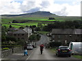 The B6479 through Horton in Ribblesdale with view towards Pen-y-ghent