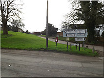 TL2256 : Roadsigns & High Green Postbox by Geographer