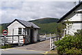 SH6918 : Building at the south end of the Penmaenpool toll bridge by Phil Champion