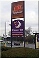 Sign for Beefeater public house and Premier Inn hotel, Finney Lane, Heald Green, near Stockport