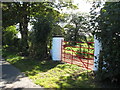 H9714 : Red painted gates on the south side of Glasdrumman Road by Eric Jones