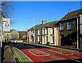 Wall postbox alongside a speed limit change on Cardiff Road, Aberdare