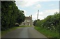 The road to Poundon passes Hare Leys Farm