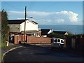 Motor boat parked on the bend of Alta Vista Close, Dawlish