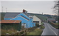 SN2912 : Houses at Cross Inn on the A4066 by Ian S