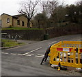 Yellow barrier enclosing a hole in the road, Cwmdare