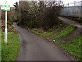 No fly tipping sign alongside a path to the Afon Cynon, Penywaun