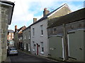 Looking from Holy Trinity Churchyard down a lane to the High Street