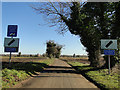 Derestriction signs and HGV warnings on Church Road