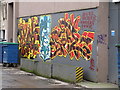 Colourful graffiti off University Road