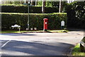 Postbox and signpost on West Drive