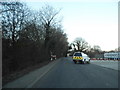 Van turning into building site on New Road