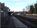TM3877 : Train leaving platform 1 Halesworth Railway Station by Geographer