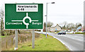 J5378 : Roundabout sign at the Six Road Ends (February 2015) by Albert Bridge
