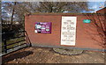 Information board and plaque next to the Bow Bridge