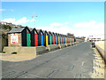 TM5491 : Colourful bathing huts by Adrian S Pye