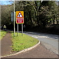 Reduce speed now sign at the edge of Littledean