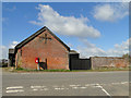 Barn and postbox at Clowes Corner