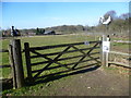 Looking over a gate at Coolings Green & Pleasant