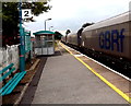 GB Railfreight train speeds through Wem station