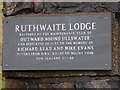 NY3513 : Commemorative plaque on Ruthwaite Lodge by Oliver Dixon