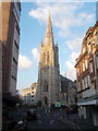 Bournemouth: St. Peter?s church from the top of a bus