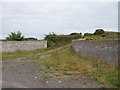 The southern end of a farm lane linking Ballyculter Road and Carrowvanny Road 