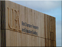TG1707 : Bob Champion Research & Education Building sign by Geographer