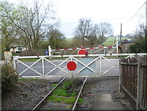 TQ8632 : The level crossing at Rolvenden station by Marathon