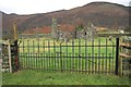 NN7023 : Gate to ruined chapel, Dundurn by Richard Sutcliffe