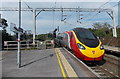 Virgin Pendolino leaves Wilmslow railway station