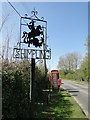 Shimpling village sign, telephone box and Dickleburgh Road