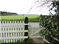 Footpath crosses road south of Clanville