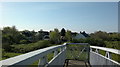 View of the rear of houses on Barley Lane from the footbridge over the A12 at Little Heath