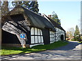 Thatched barn attached to house