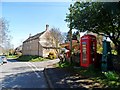 SK9415 : Pump and telephone box, Stretton by Bikeboy