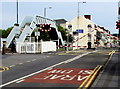 SS5099 : Level crossing barriers descend across the B4304, Llanelli by Jaggery