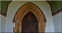 SK9857 : Navenby: St Peter's Church; Detail of entrance in south porch by Michael Garlick