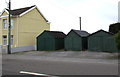 Dark green lock-up garages, Bonllwyn