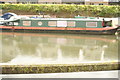 View of a narrowboat moored on the River Lea