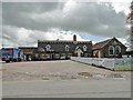 Brewery lorry making a delivery to The Bull at Bacton