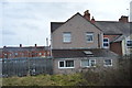 SJ3044 : House right by the railway line, Ruabon by N Chadwick
