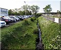 Small stream at the edge of  Riverside Leisure Club, Little Stoke