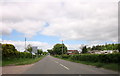 SP0653 : B4088 Dunnington Heath, Hilliers Farm on Right by Roy Hughes
