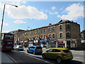 TQ3978 : Shops on Woolwich Road by Stephen Craven
