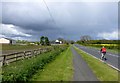 NZ2385 : Cyclist on the A196 by Russel Wills