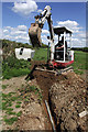 Installing water pipe to cattle trough